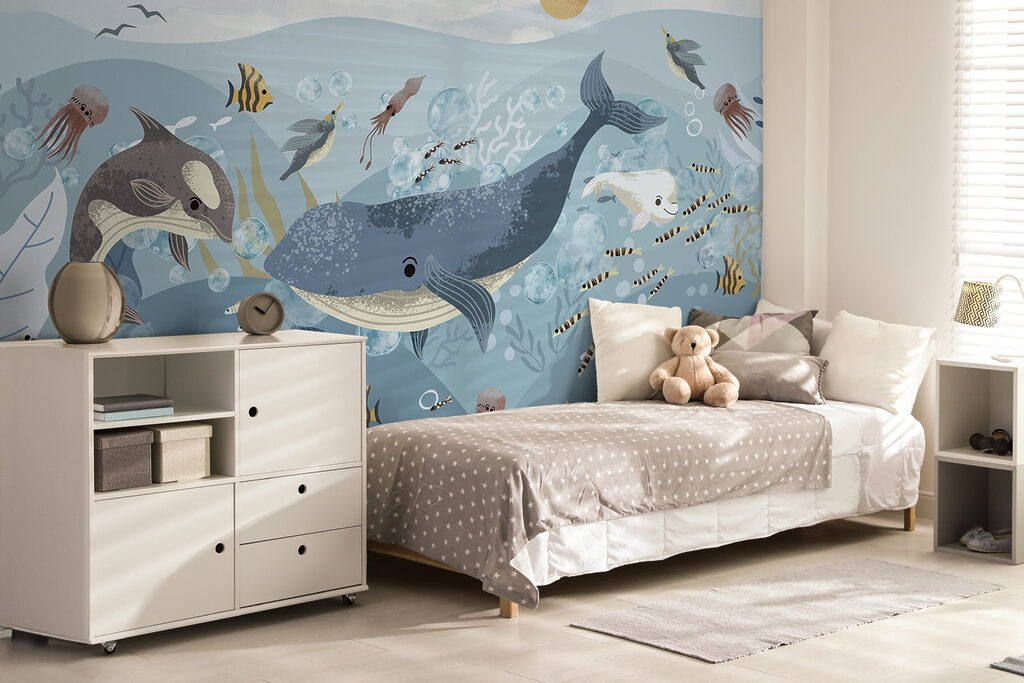 Group of fish and whales swimming in the ocean Group of fish and whales swimming in the ocean