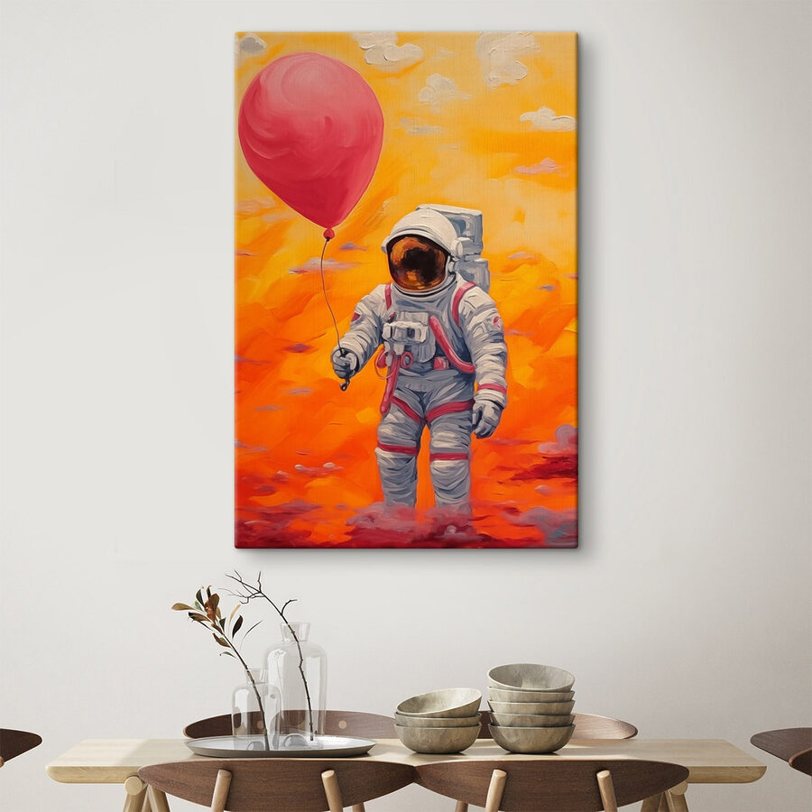 Astronauta trzymający balon