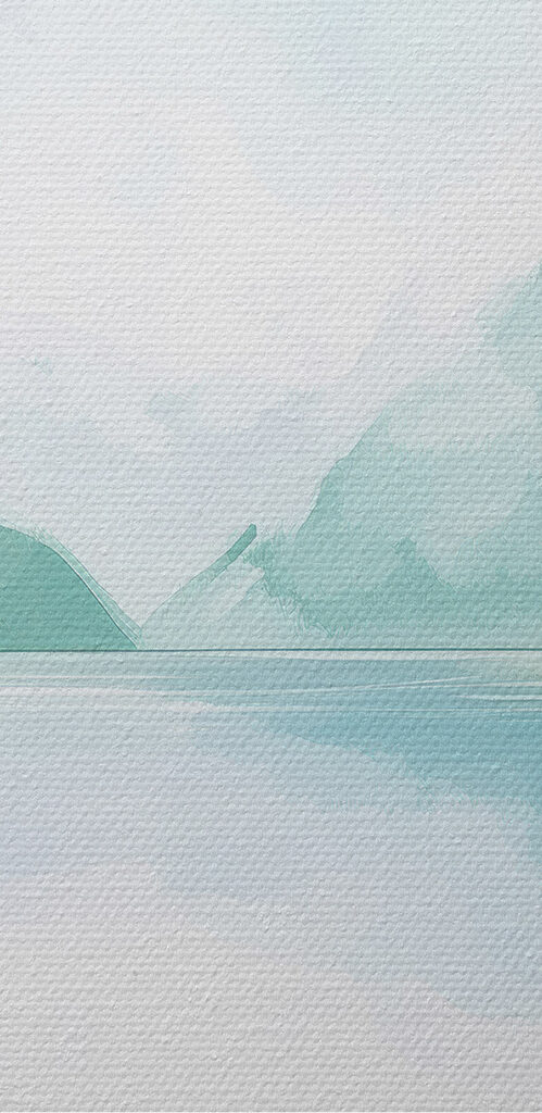Water with trees and mountains in the background Water with trees and mountains in the background