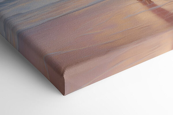 Woman in a swimsuit holding a surfboard on a beach