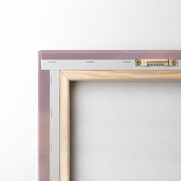 Woman in a swimsuit holding a surfboard on a beach