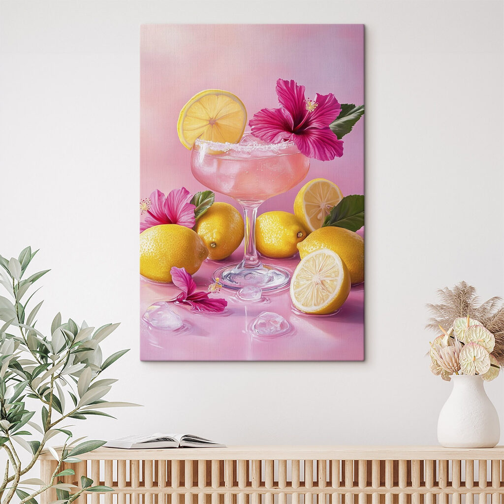 Glass with pink drink and lemons