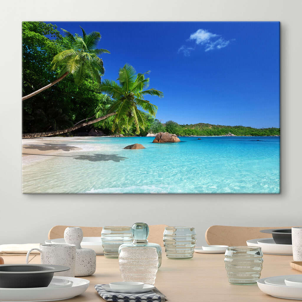 A beach with palm trees and blue water A beach with palm trees and blue water