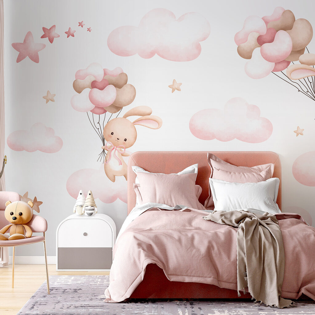 Group of pink clouds and a bunny holding balloons