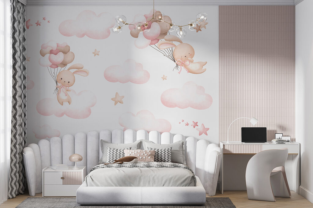 Group of pink clouds and a bunny holding balloons