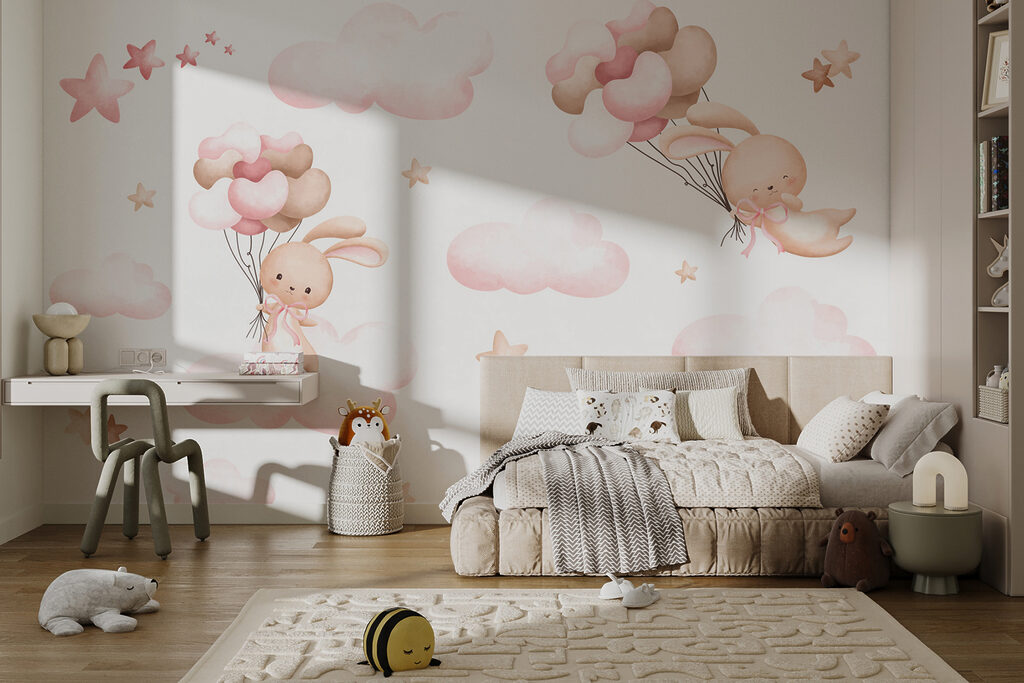 Group of pink clouds and a bunny holding balloons