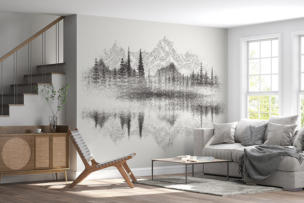 A mountain range and trees reflected in a lake