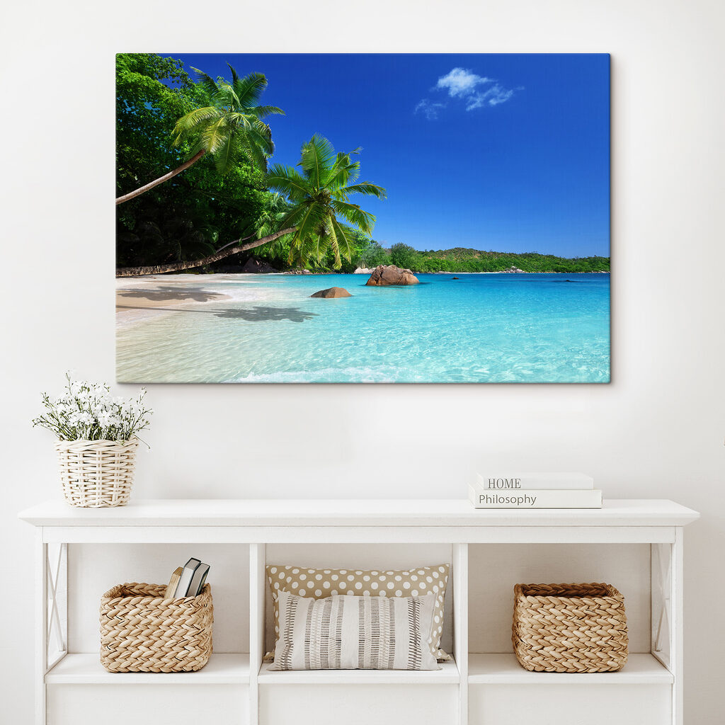 A beach with palm trees and blue water A beach with palm trees and blue water