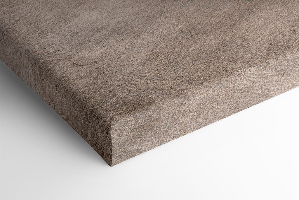 A beach with waves and a sunset