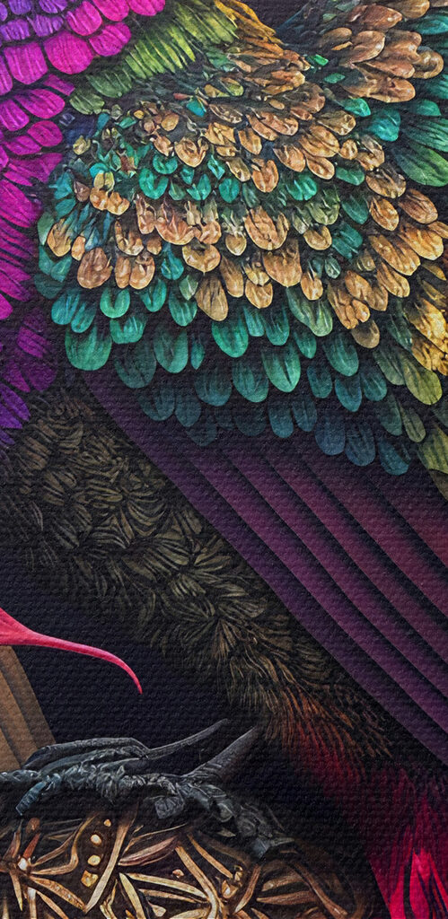 A colorful bird sitting on a ball of flowers A colorful bird sitting on a ball of flowers