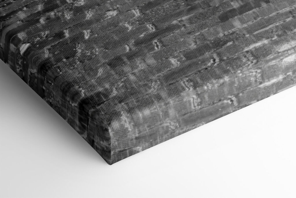 A red umbrella in a street with a tower in the background