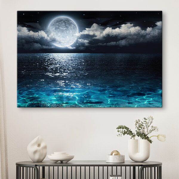 A moon over water at night A moon over water at night