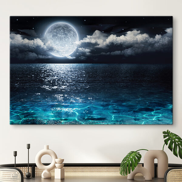 A moon over water at night A moon over water at night