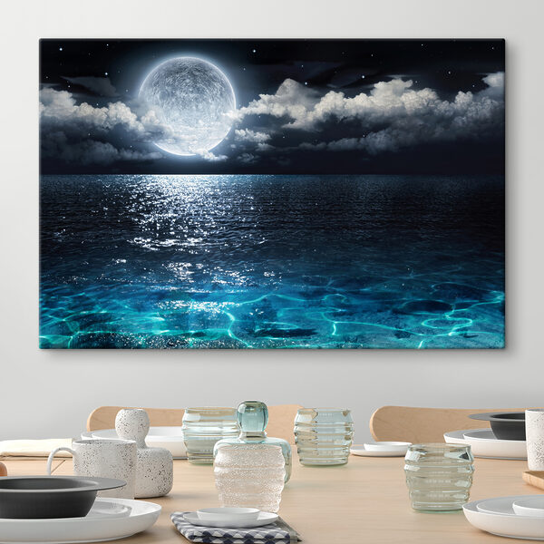 A moon over water at night A moon over water at night