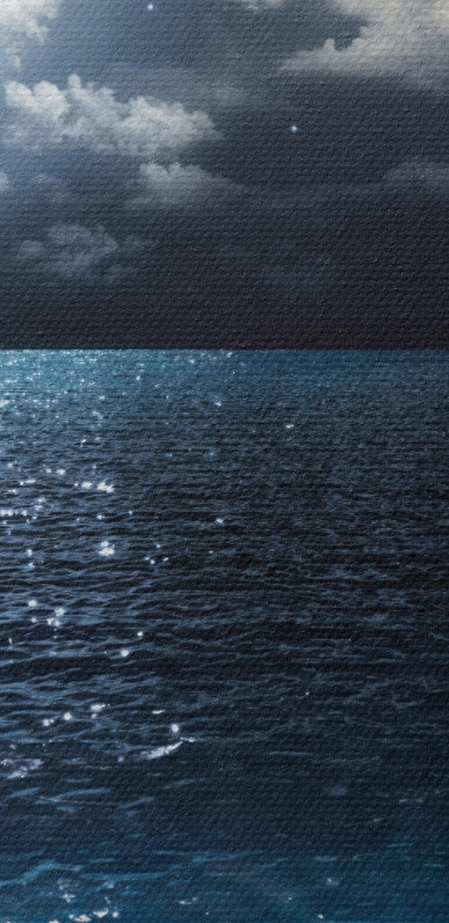A moon over water at night A moon over water at night