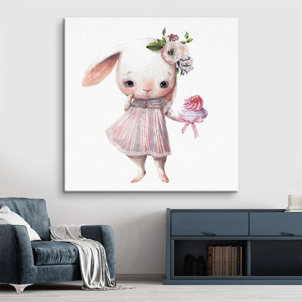 A cartoon of a bunny holding a cupcake