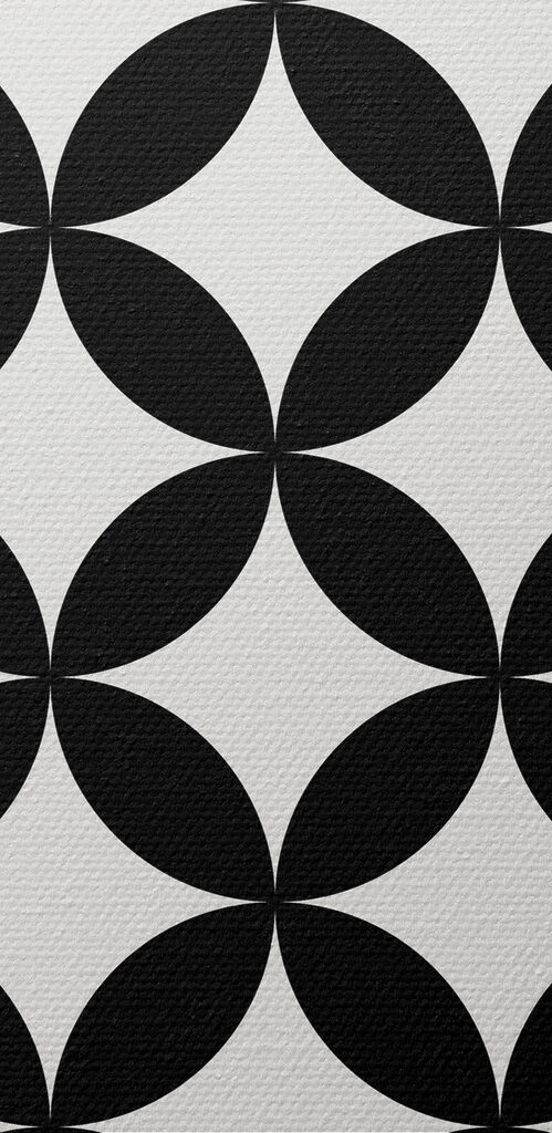 A black and white cover with a pattern of circles A black and white cover with a pattern of circles