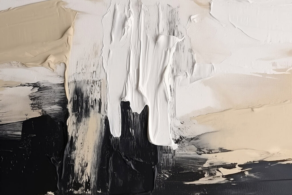 White and black paint on a white surface
