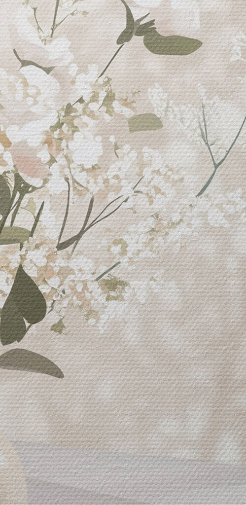 Cup of coffee and a vase of flowers on a window sill