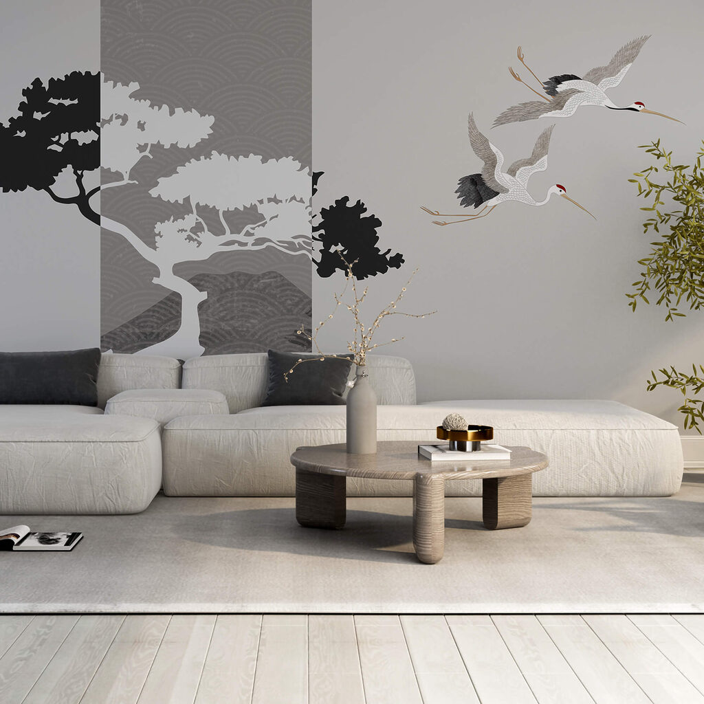 Para żurawi lecących obok drzewa Para żurawi lecących obok drzewa