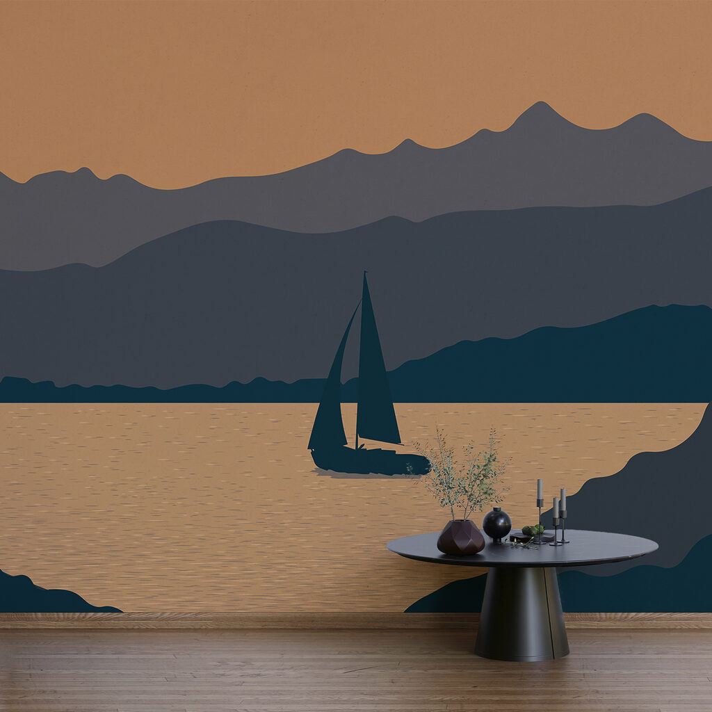 Żaglówka na wodzie z górami w tle