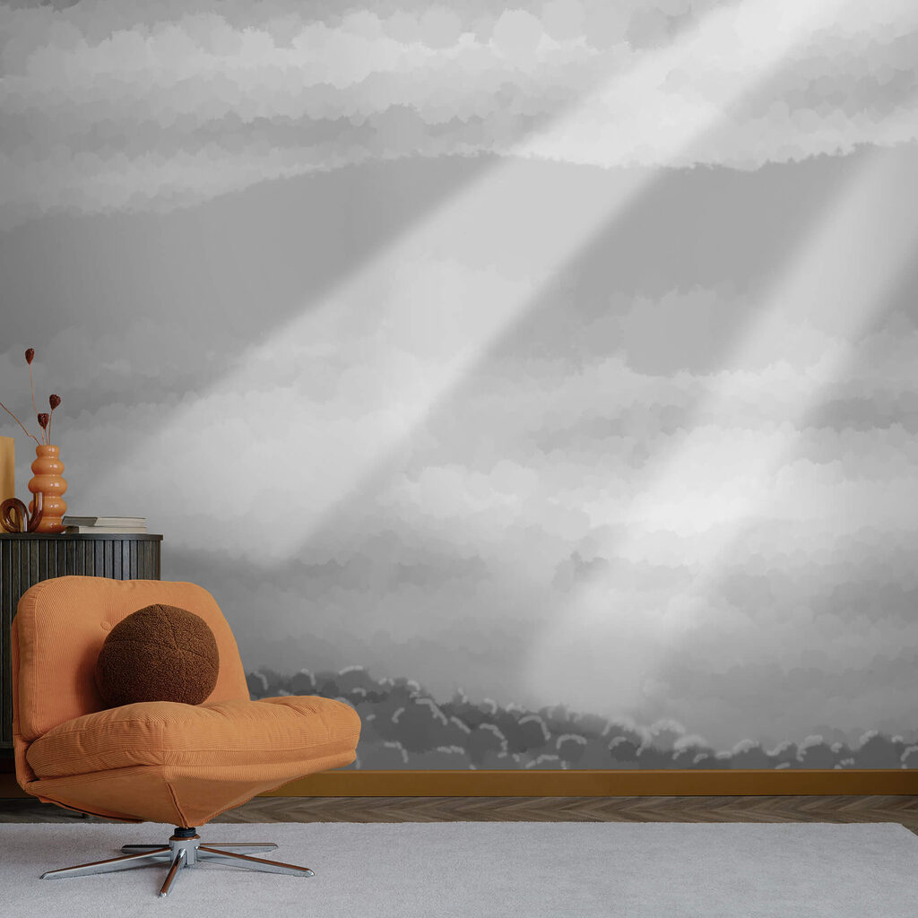 Obraz w skali szarości przedstawiający chmury i promienie słoneczne