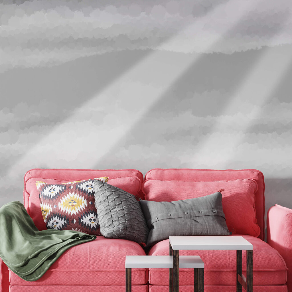 Obraz w skali szarości przedstawiający chmury i promienie słoneczne