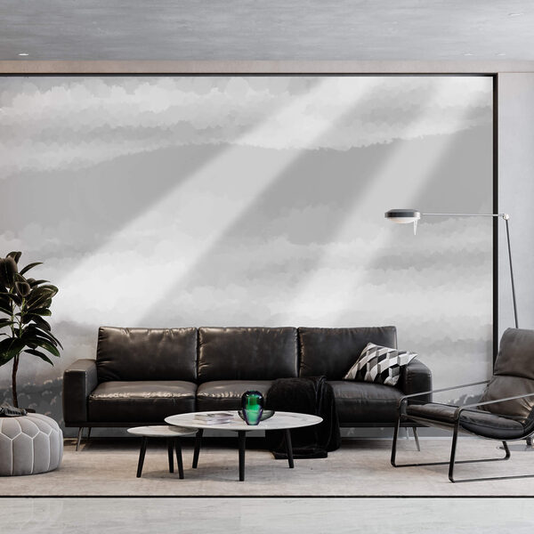 Obraz w skali szarości przedstawiający chmury i promienie słoneczne