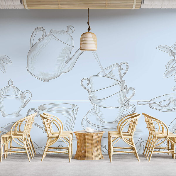 Czajniczek nalewający herbatę do stosu filiżanek Czajniczek nalewający herbatę do stosu filiżanek