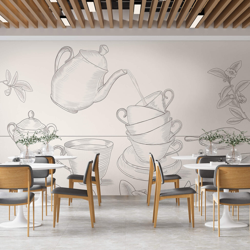 Czajniczek nalewający herbatę do stosu filiżanek Czajniczek nalewający herbatę do stosu filiżanek