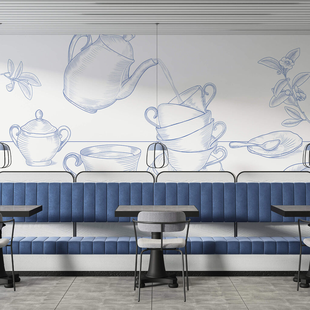 Czajnik nalewający herbatę do stosu filiżanek