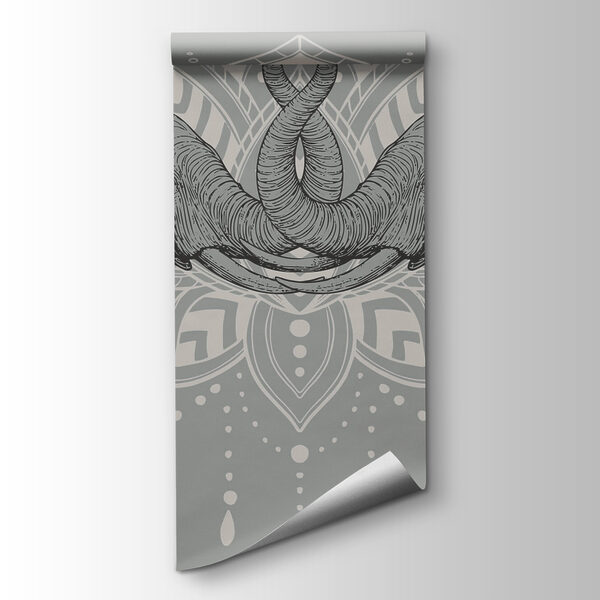 Two elephants with their trunks touching each other