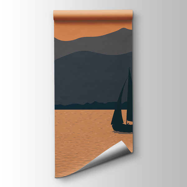 Sailboat on water with mountains in the background