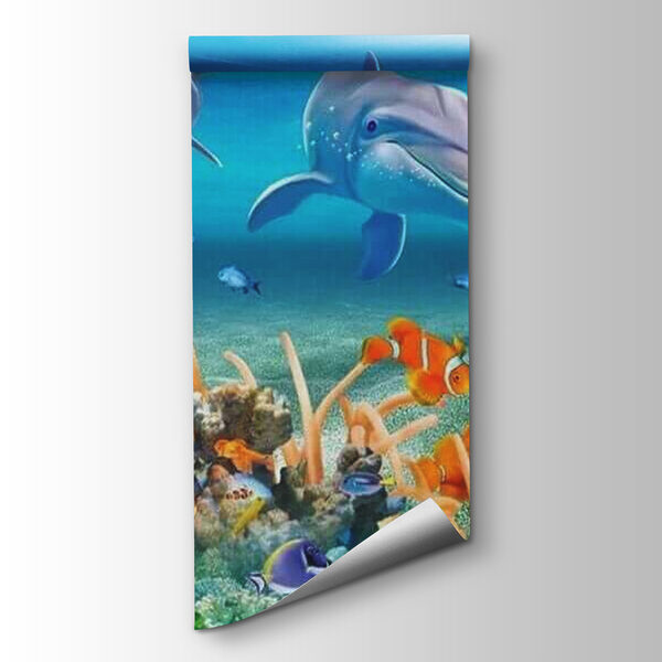 Group of fish and dolphins swimming in the ocean