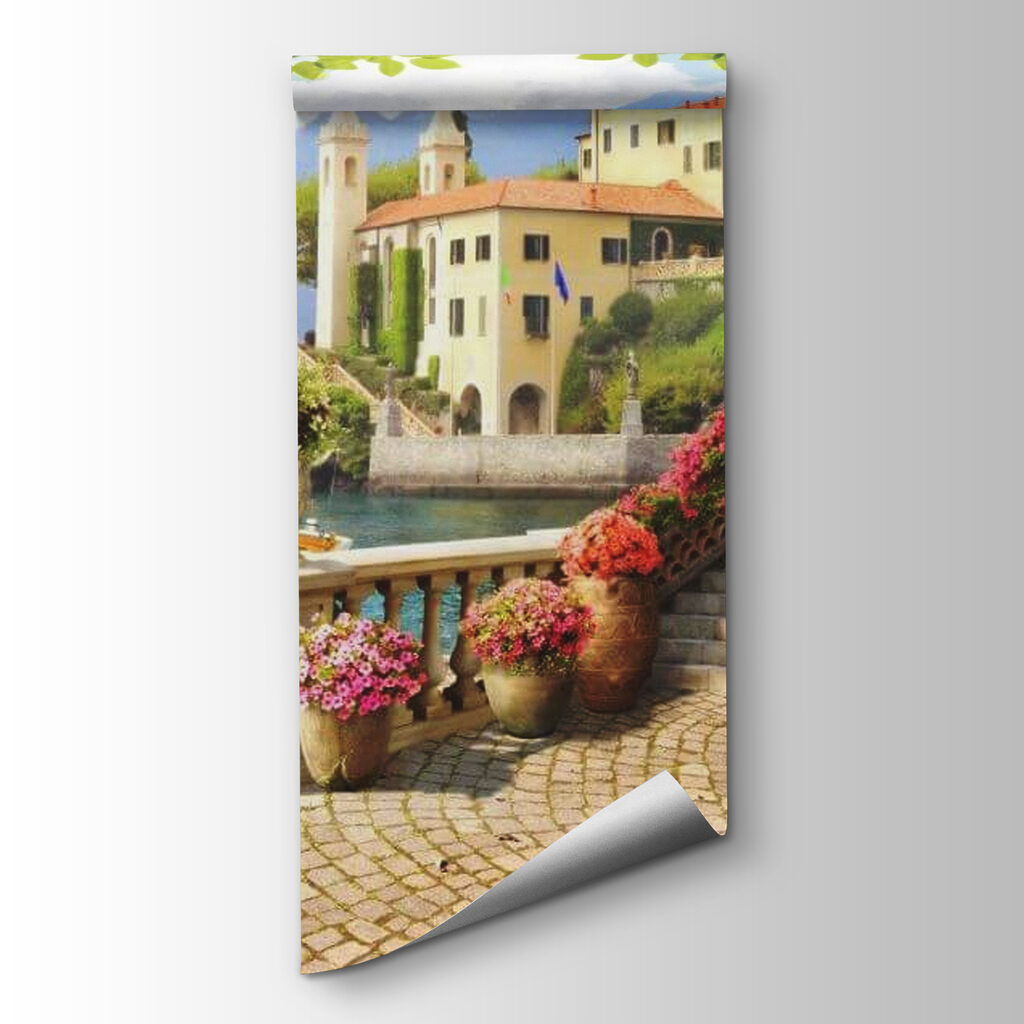 Stone walkway with stairs and flowers on the side of the water