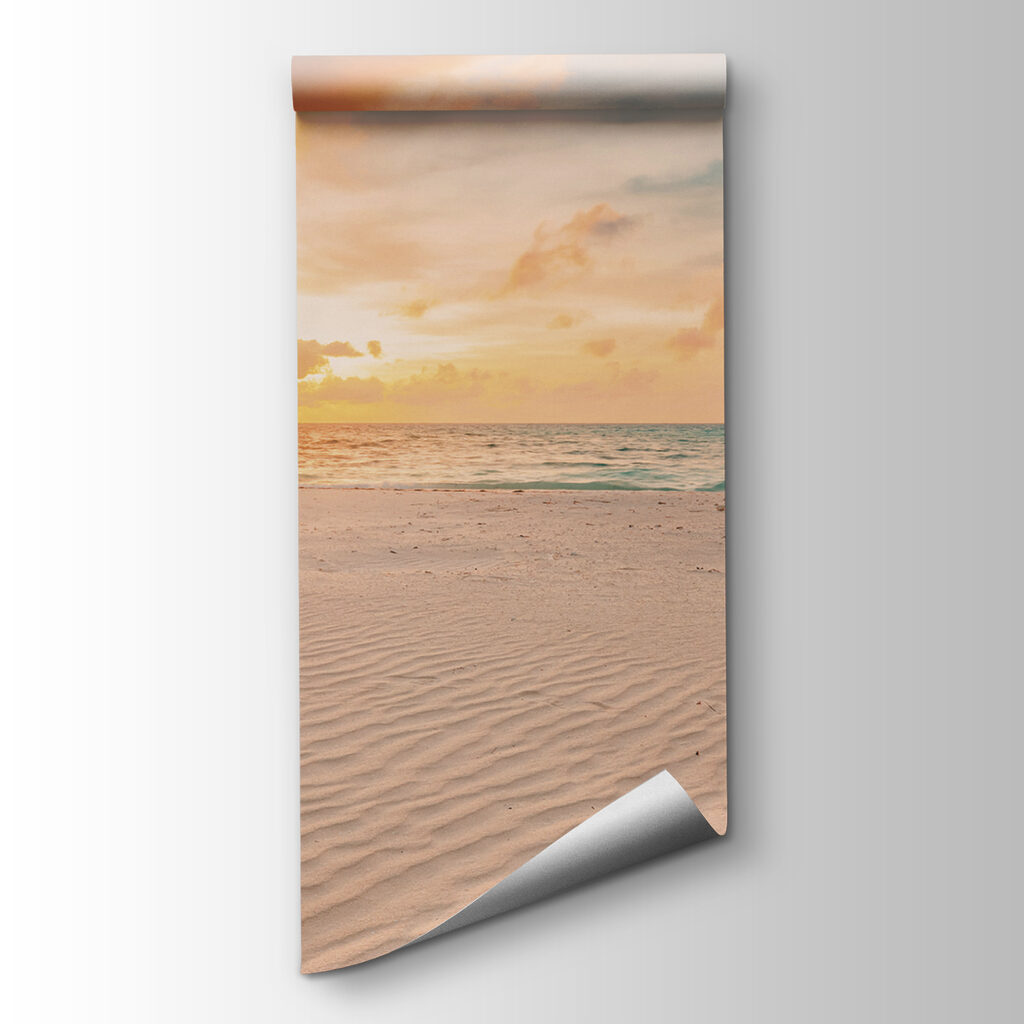 A sandy beach with waves and a sunset A sandy beach with waves and a sunset