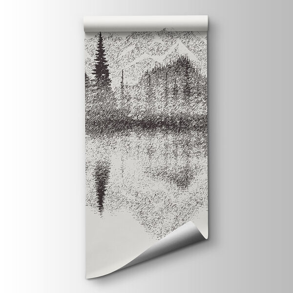 A mountain range and trees reflected in a lake