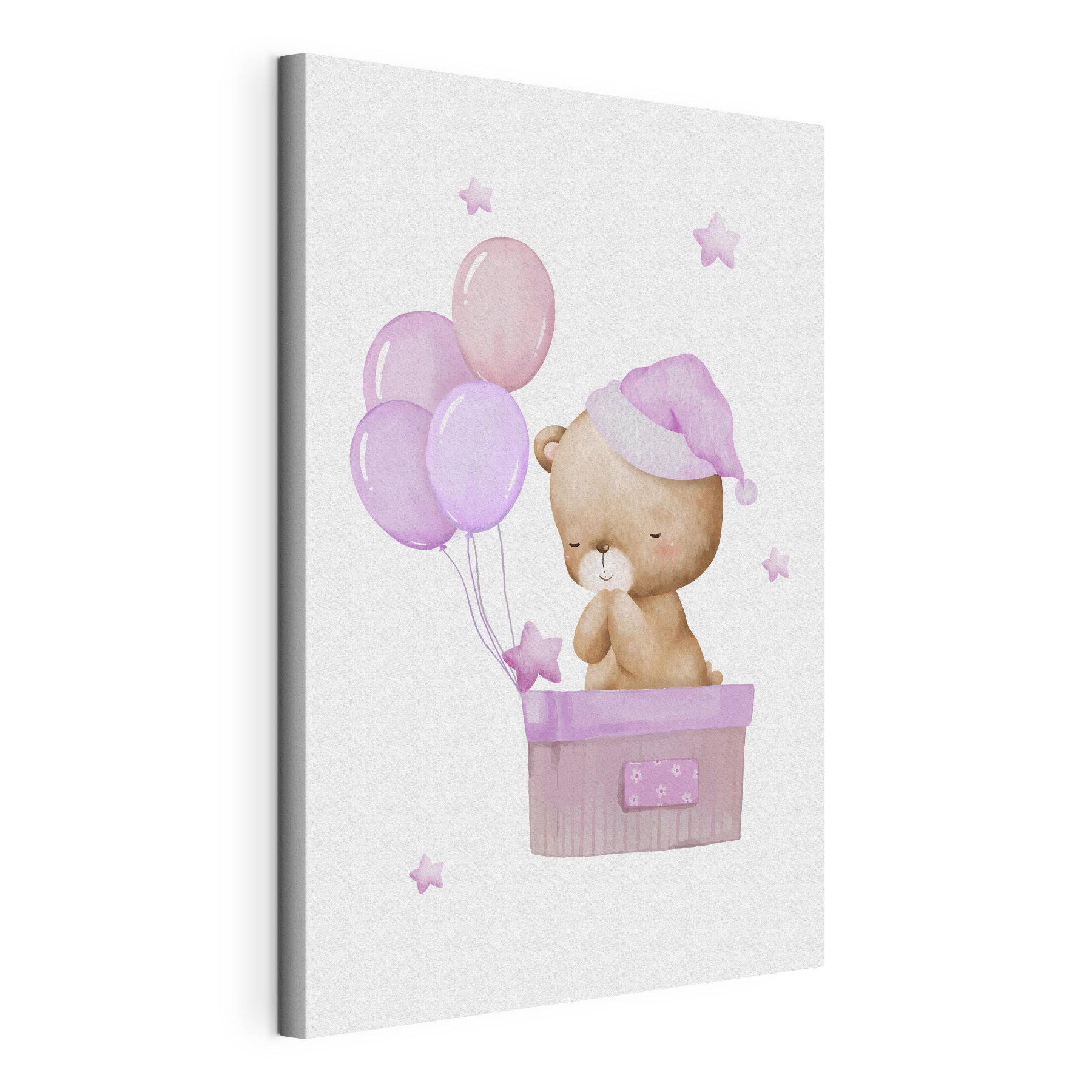 A teddy bear in a basket with balloons