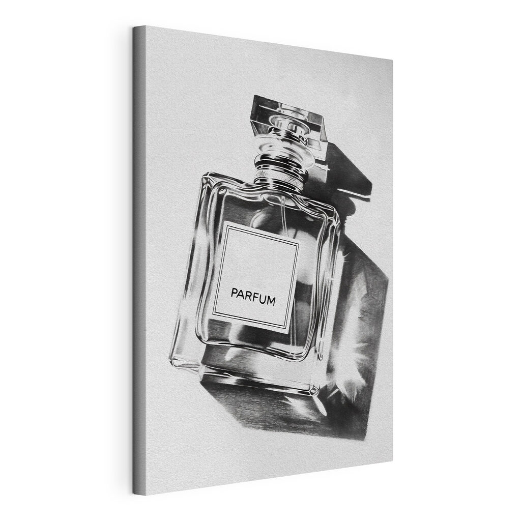 A black and white photo of a bottle of perfume