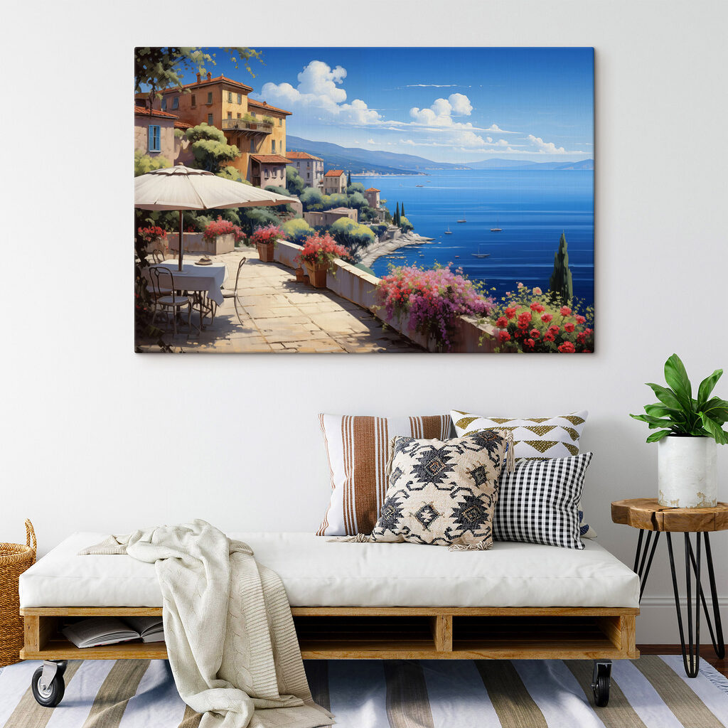 View of a town and the ocean from a balcony