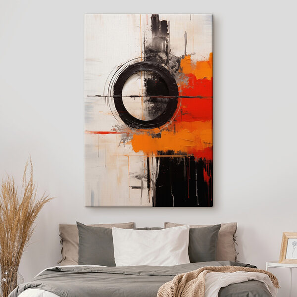Black circle with orange and black paint
