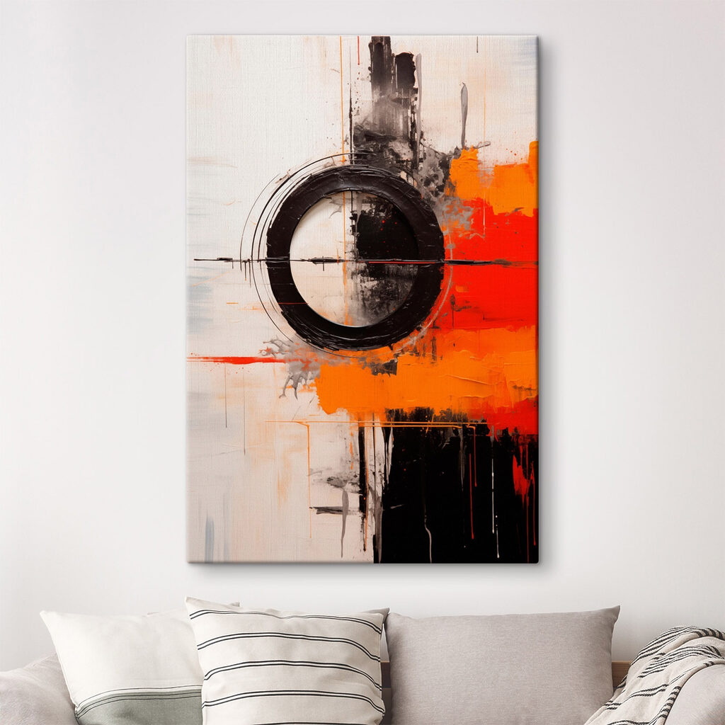 Black circle with orange and black paint