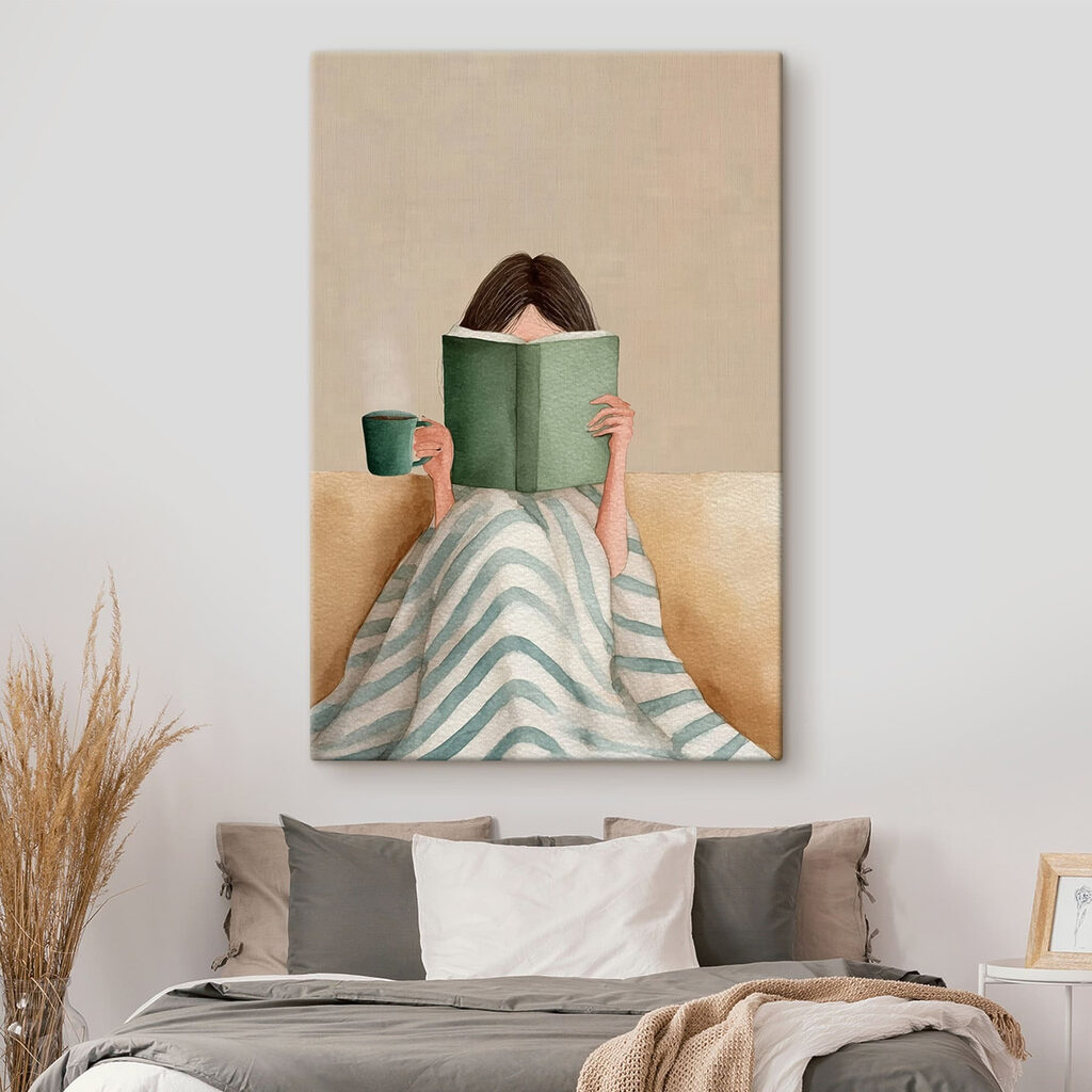 Woman reading a book and holding a cup Woman reading a book and holding a cup