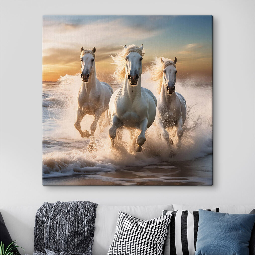 Group of white horses running on a beach Group of white horses running on a beach