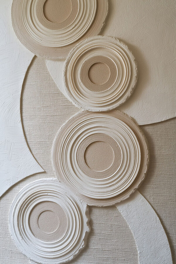 - Circular patterns on textured background