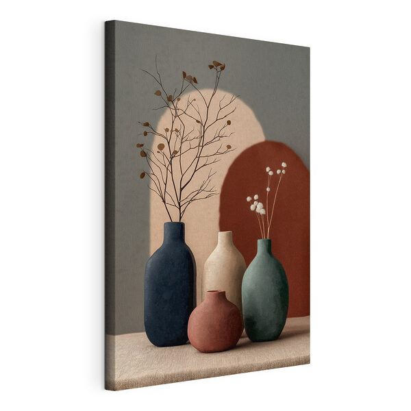 Group of vases with flowers in them