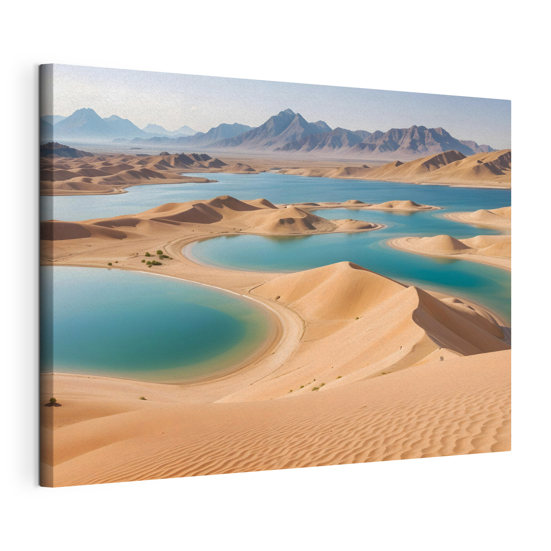 Desert with water and mountains in the background