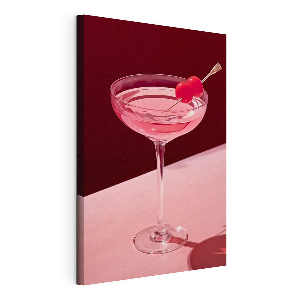 Glass with pink liquid and two cherries on it Glass with pink liquid and two cherries on it