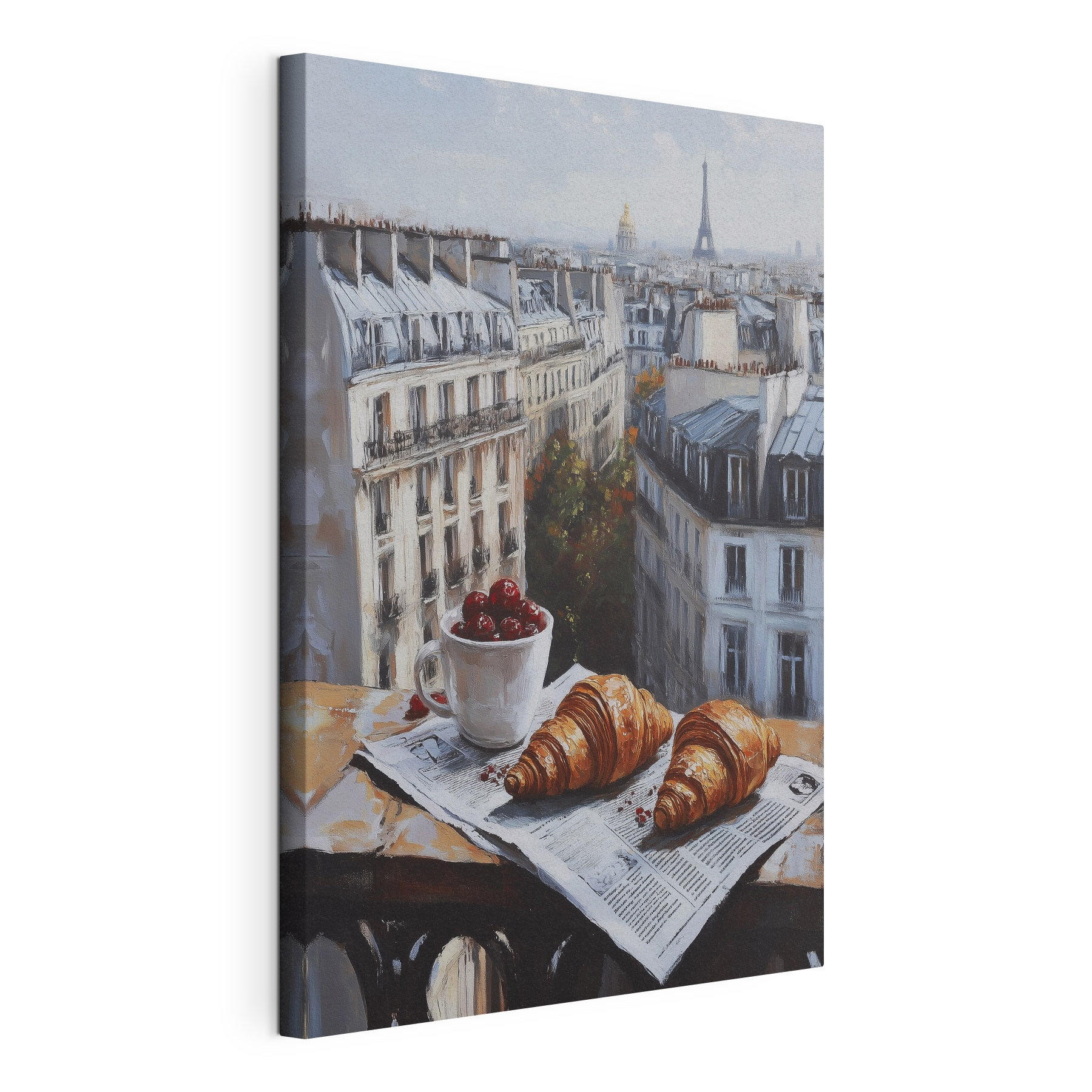 Cup of coffee and croissants on a table with buildings in the background