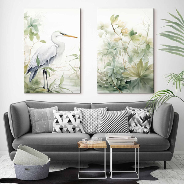 White bird with a long beak and a long beak standing in front of a plant White bird with a long beak and a long beak standing in front of a plant